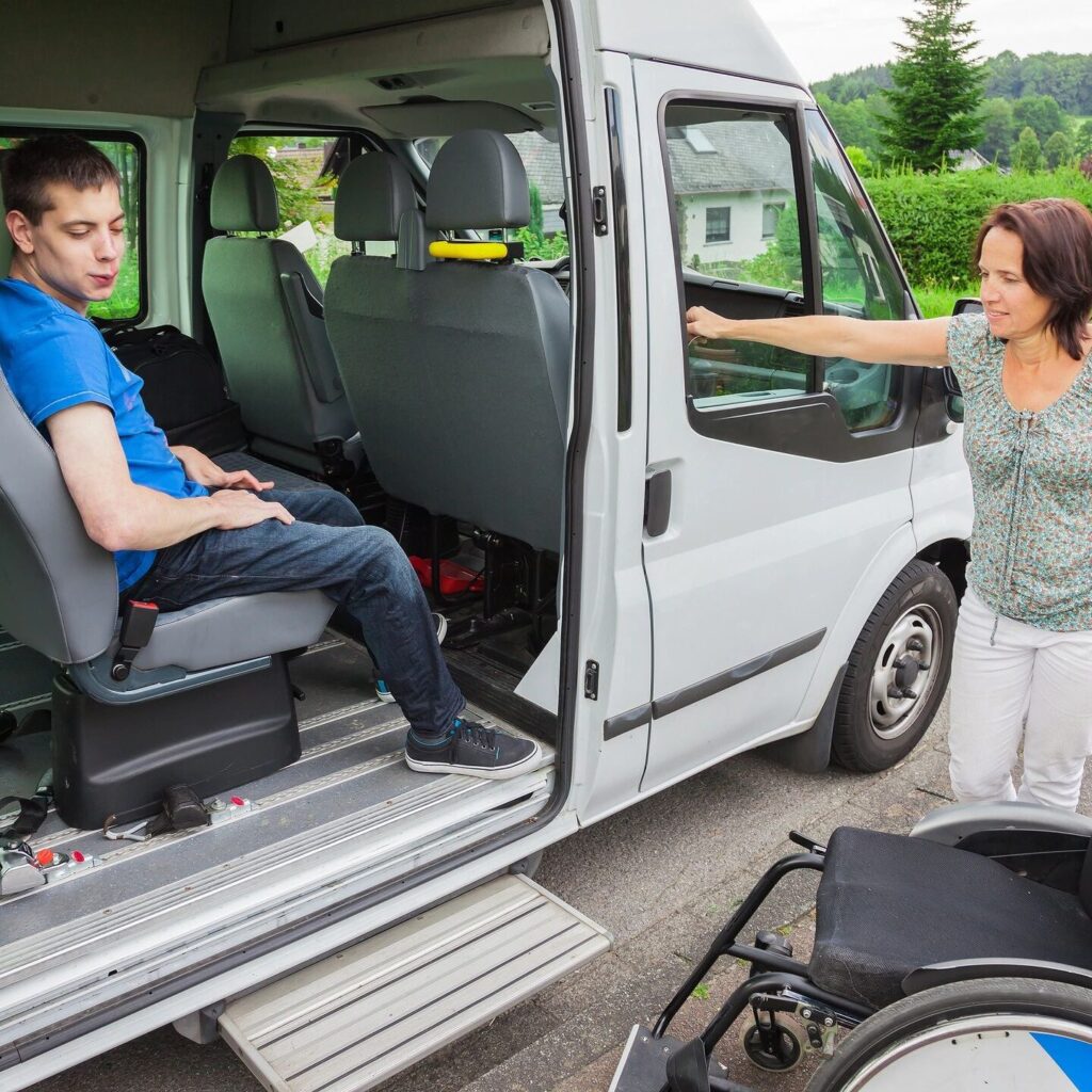 wheelchair user exiting an accessible vehicle