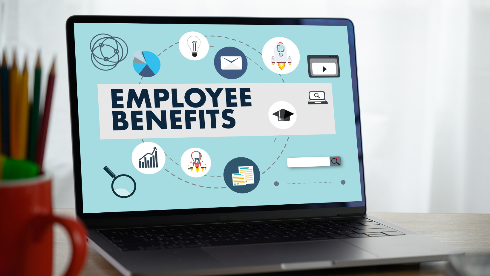 Laptop screen which reads: Employee Benefits