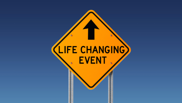 Road sign saying "Life Changing Event"