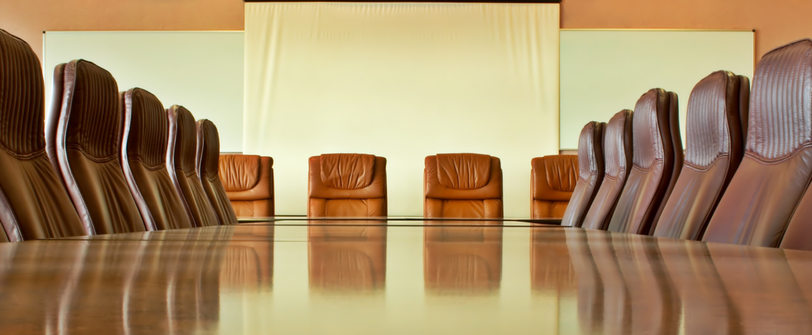 Empty chairs in a boardroom