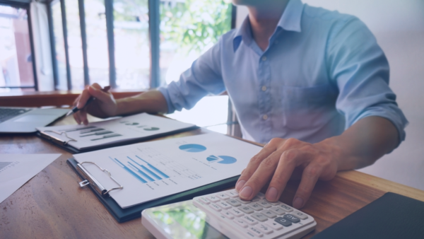 Business owner looking at financial papers.